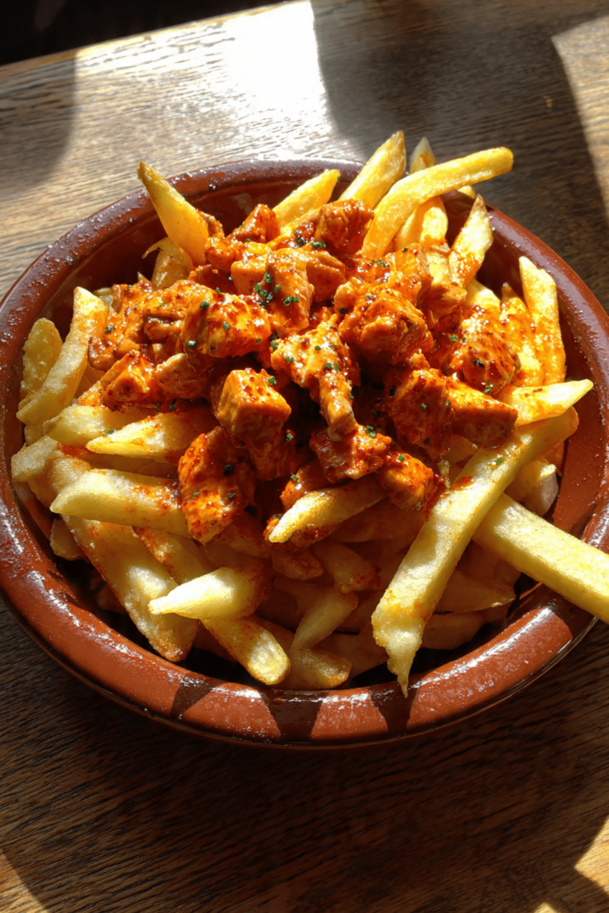 Zorza de Pollo (Paprika Chicken Over Fries)